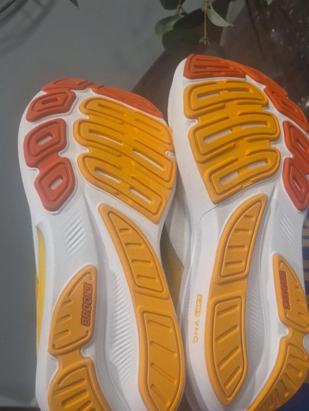 New Brooks Men's Revel 9 White Running Shoes with Yellow and Orange Accents